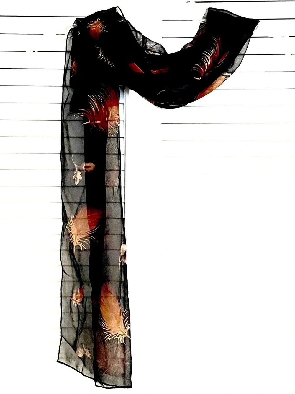 Echo Black Scarf with Orange and Gold Feather Motif!